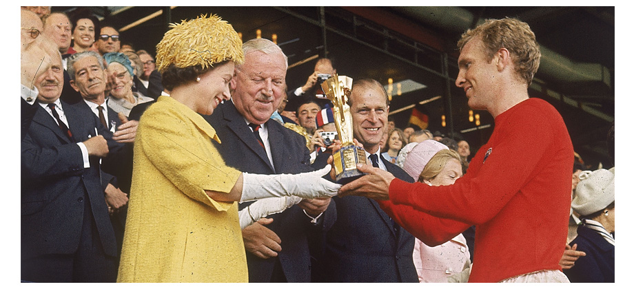 The Queen presents the World Cup Trophy to England’s Bobby Moore, 1966